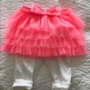 Pink skirt and white leggings